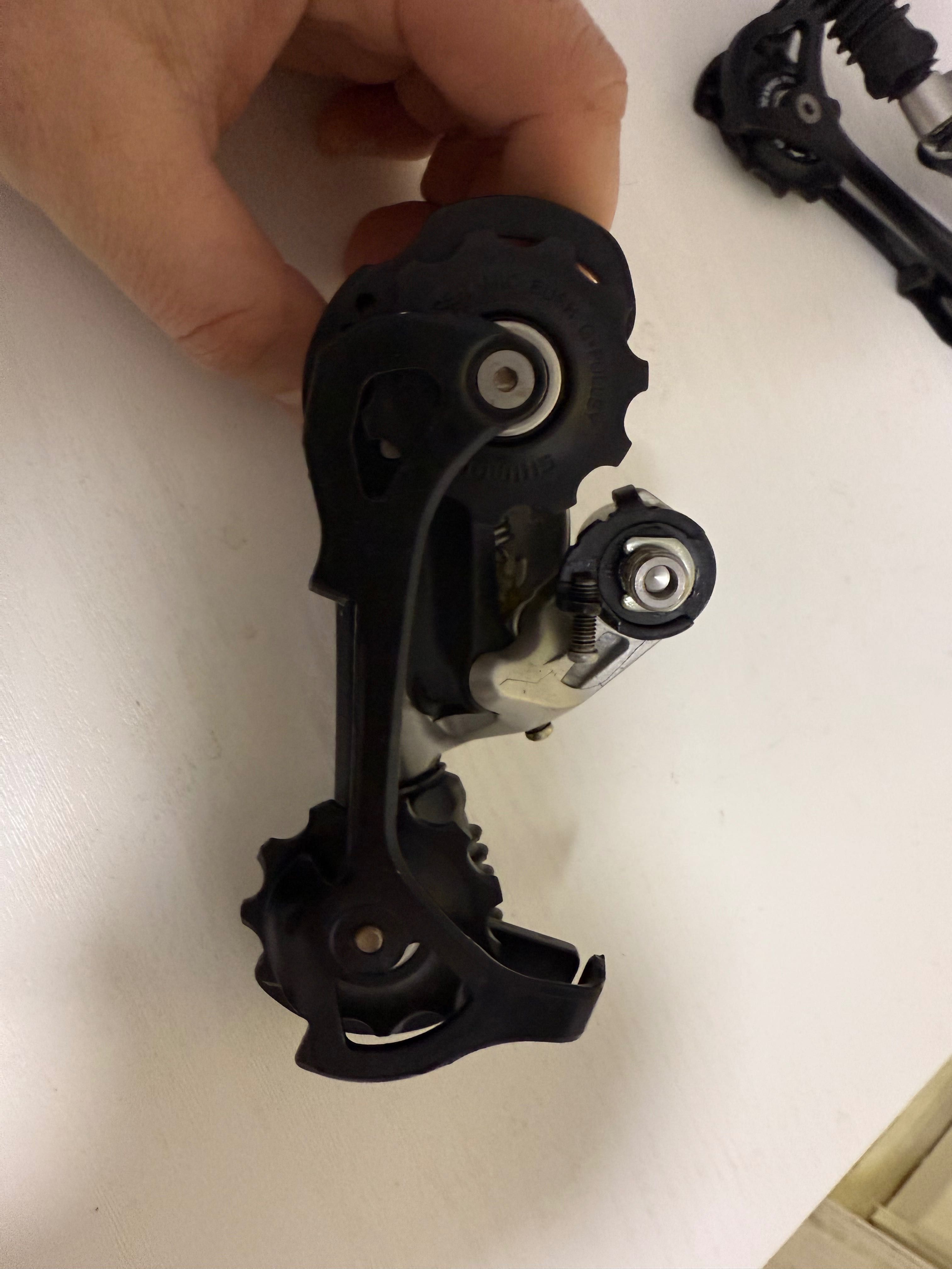 Задній перемикач Shimano Deore XT M750 9 швидкостей
