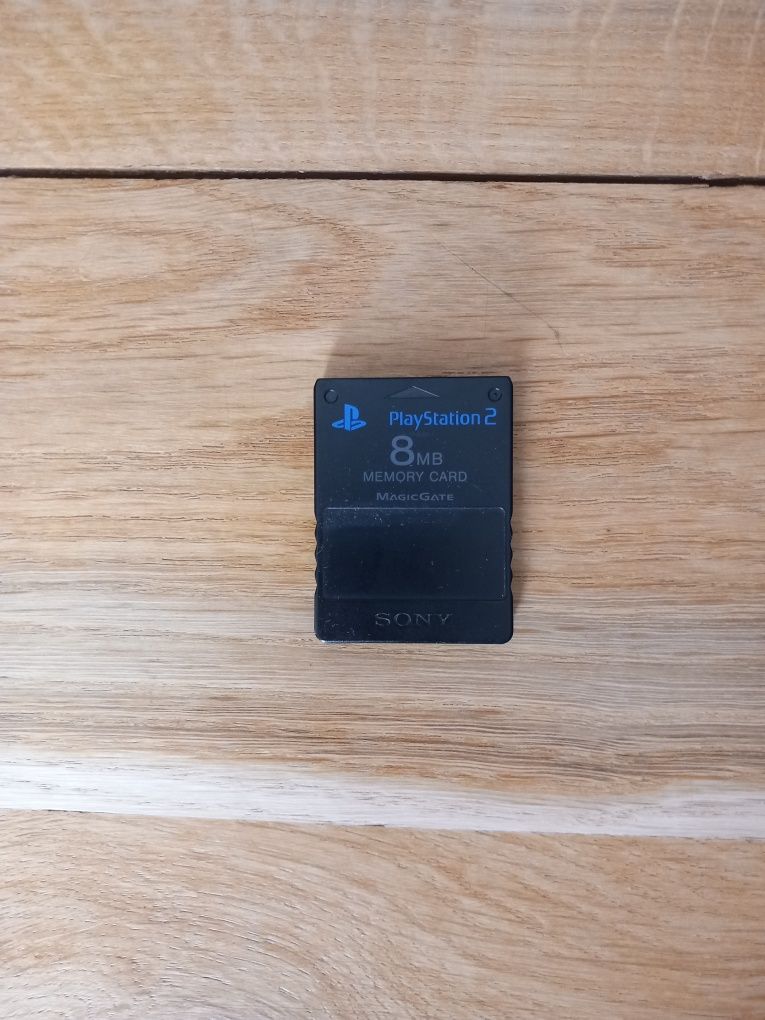 Playstation 2 com 12 jogos + comando +cartão de memória + cabos.