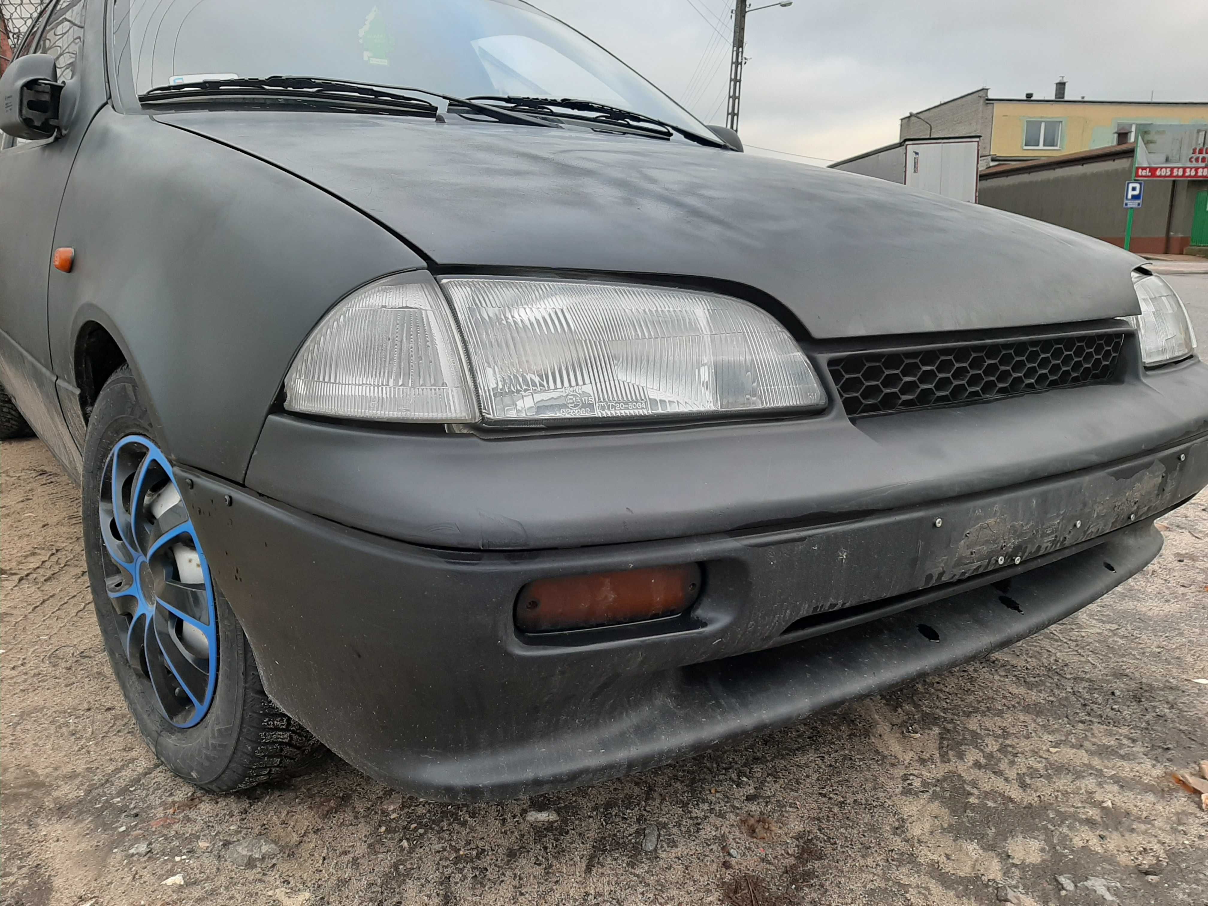 Suzuki Swift 1.0i 1996r.Zderzak przedni