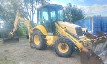 New holland  LB 110 koparko-ładowarka -- sterowanie joystick