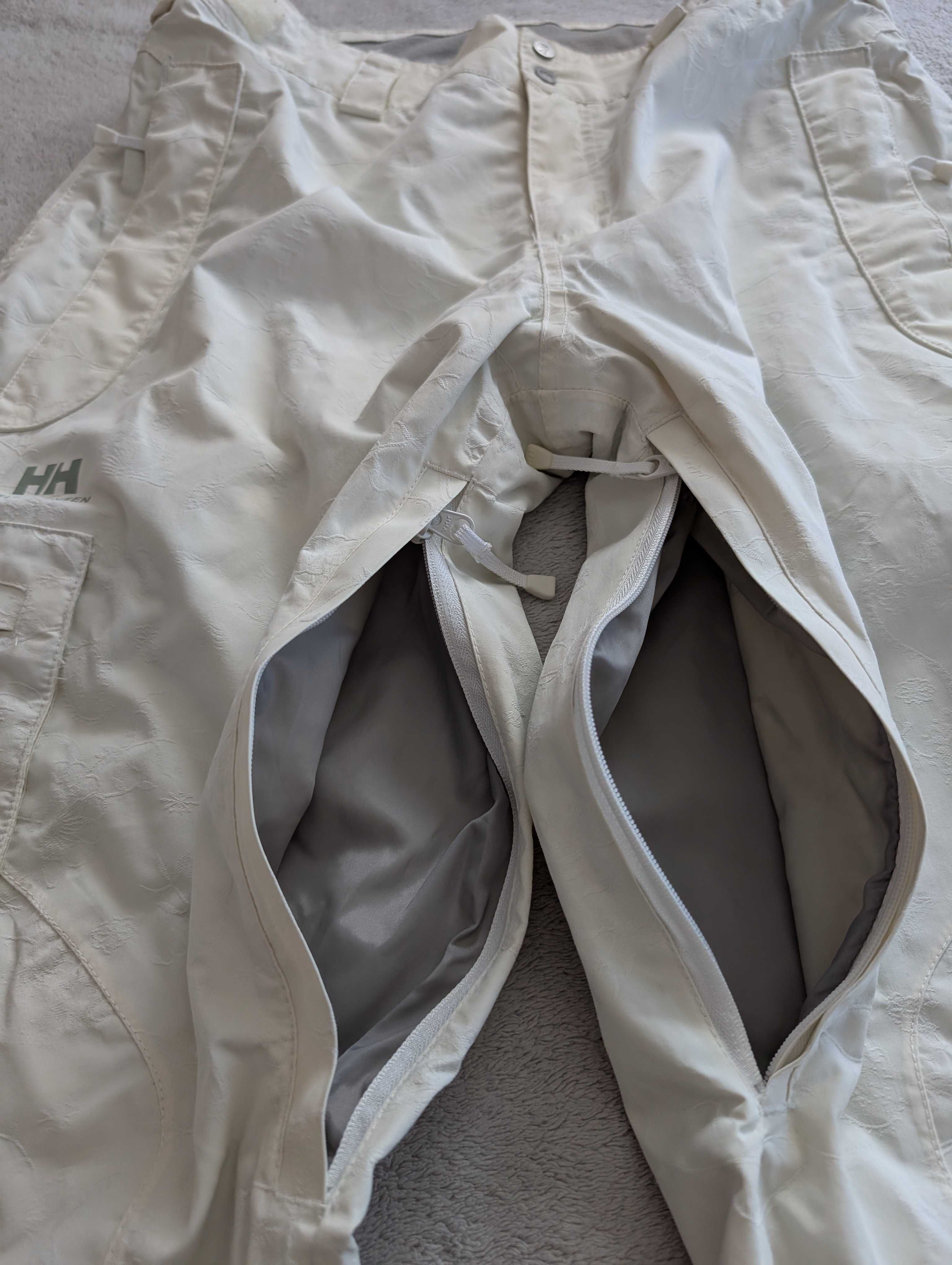 Kremowe spodnie narciarskie haftowane w kwiatki Helly Hansen Tech M 38