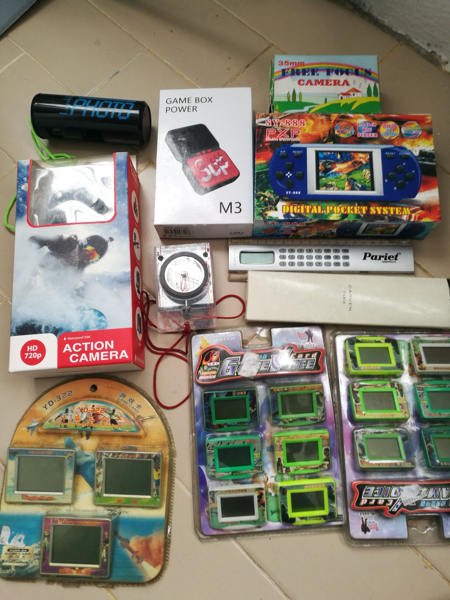 Lote de jogos e câmaras fotográfica