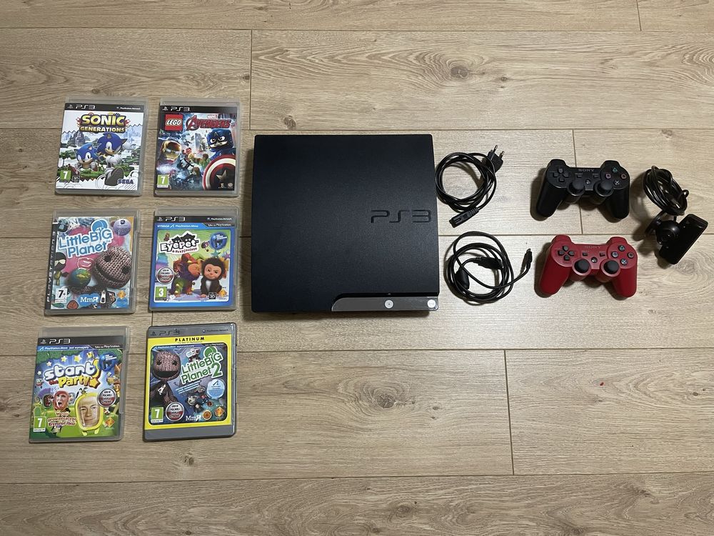 Konsola PS3 + 2 pady + kamerka + zestaw gier