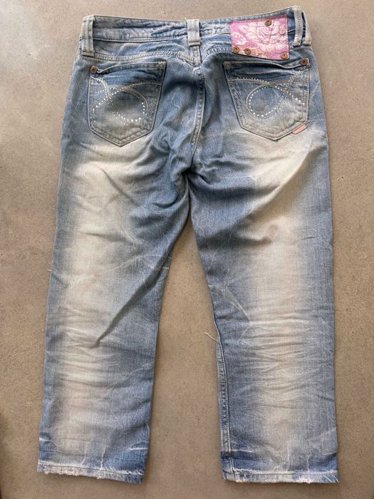 Spodnie z dziurami za kolano River Island rozm. 12