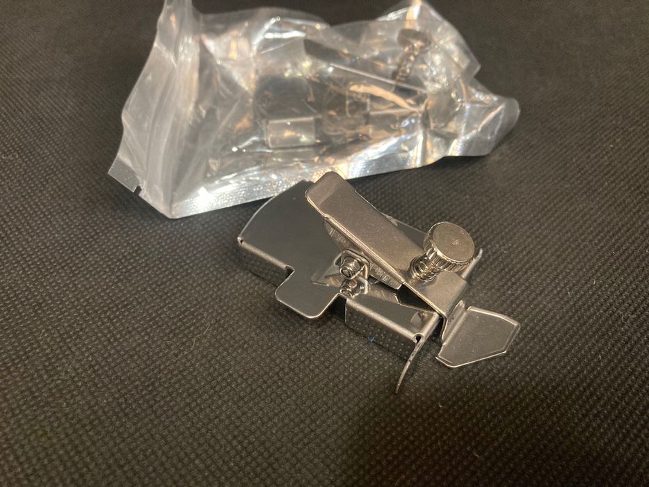 Magnetyczna prowadnica do maszyny do szycia