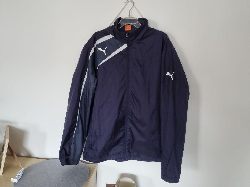 Kurtka Puma Spirit Rain Jacket. Wiatrówka przeciwdeszczowa ortalionowa