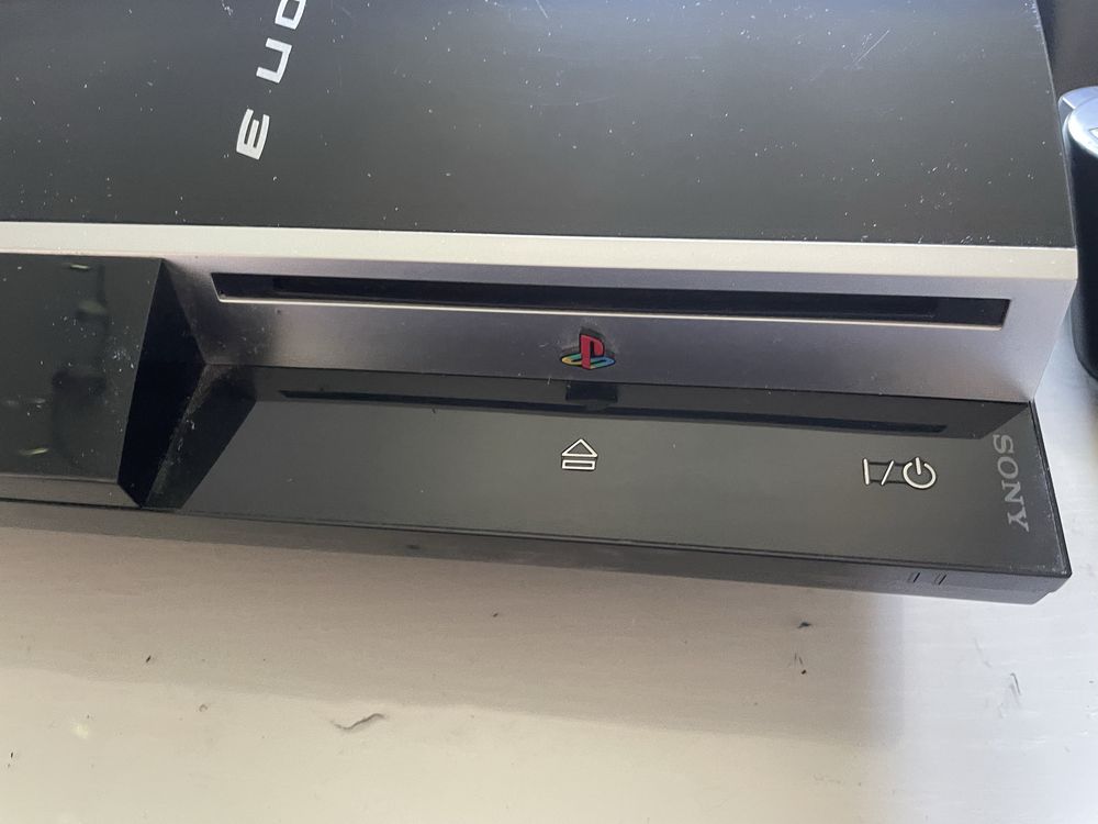 Playstation 3 CECHM03 + 4 pady + gry