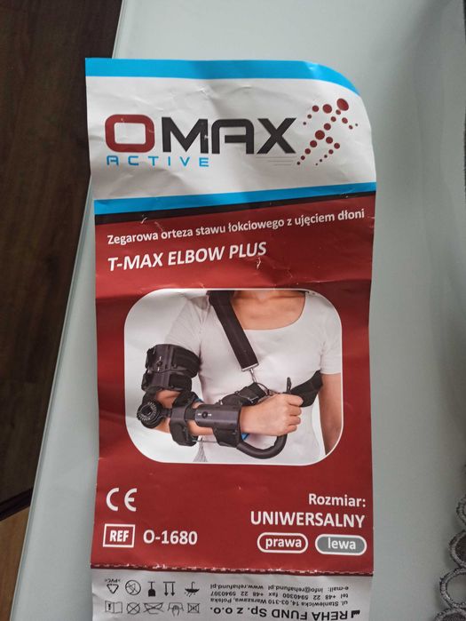 Zegarowa orteza stawu łokciowego z ujęciem dłoni lewa