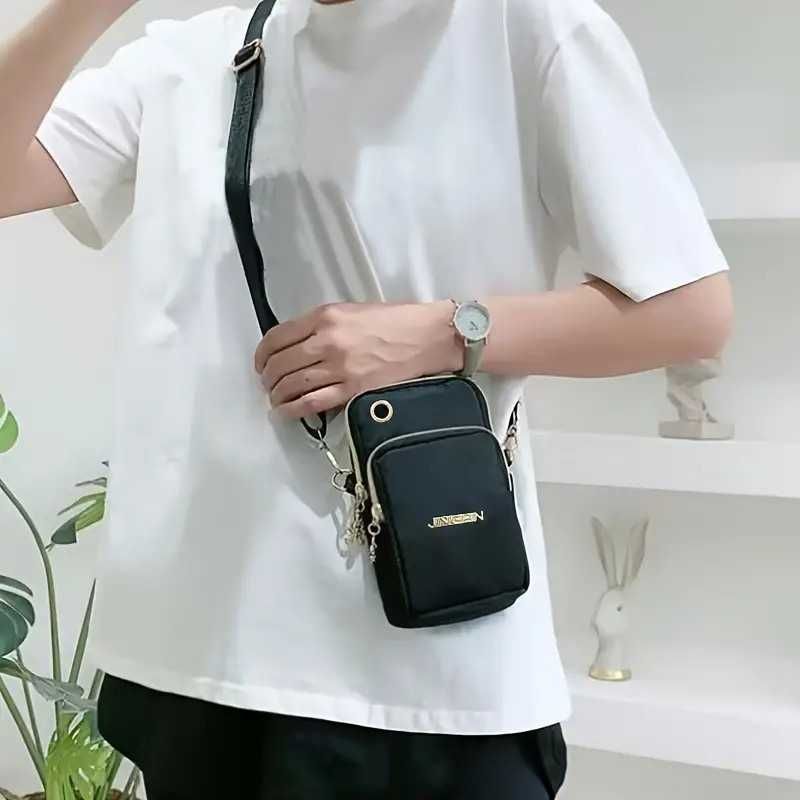 Mala/Bolsa a tiracolo casual. Nova.