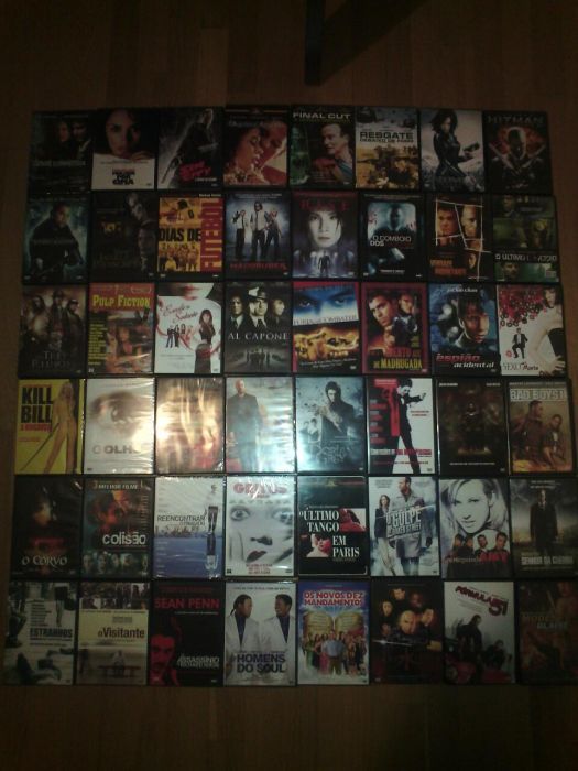 Coleção de 50 DVD novos na caixa Filmes recentes a 0.50 cêntimos cada