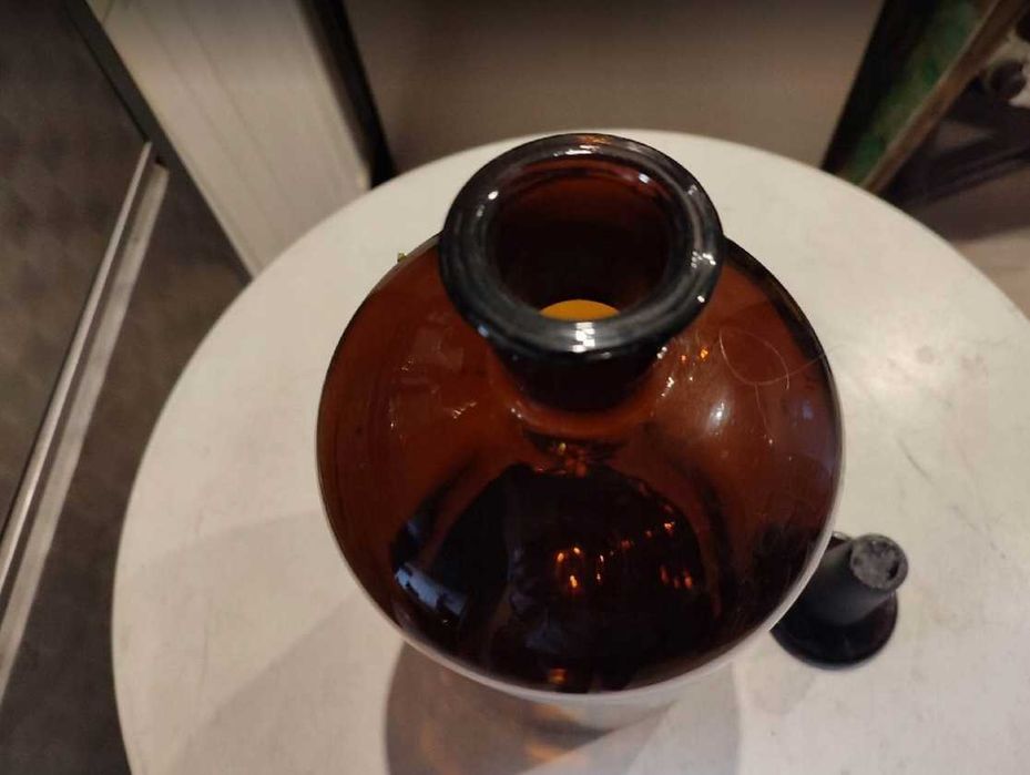 Przedwojenna brązowa szklana butla apteczna