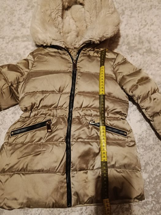 Гарненька зимова курточка для дівчинки 120см