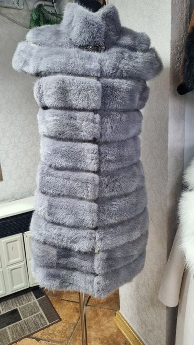 Норкрвая голубая жилетка