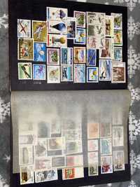 515 sztuk znaczków kolekcjonerskich z klaserem
