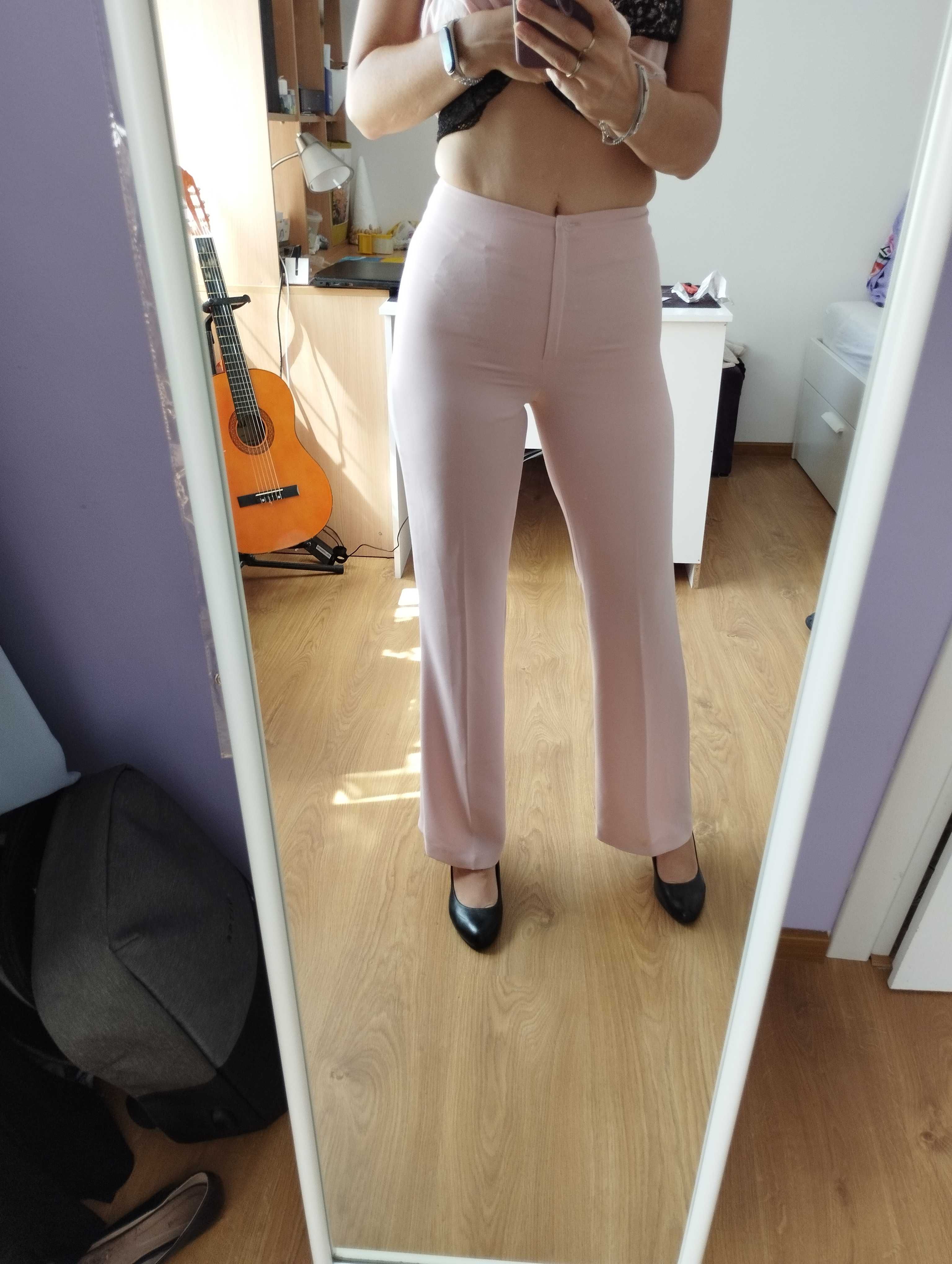 Spodnie eleganckie jasno różowe 38