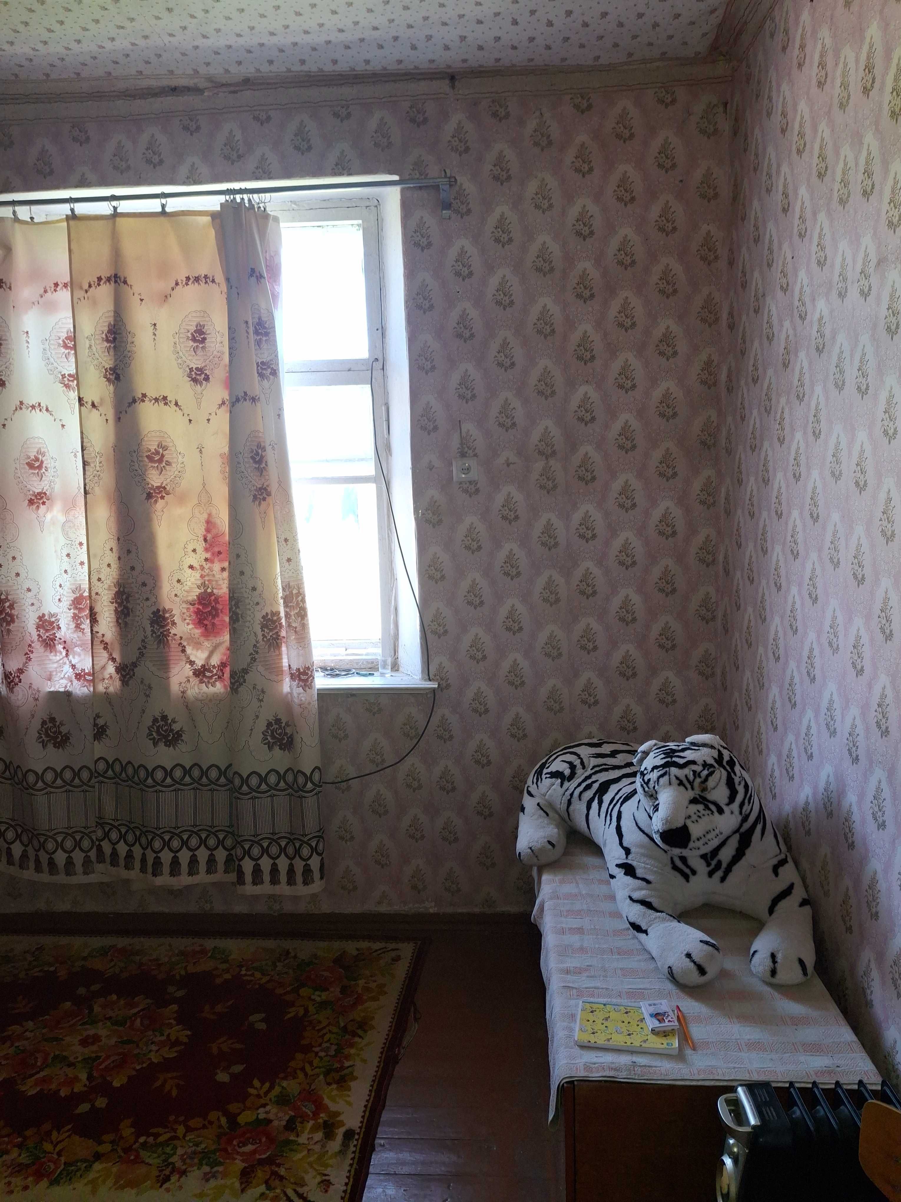 Продам будинок /4-х кімнатну квартиру