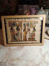 Папирус из Египта (рисунок) под стеклом монетное дерево