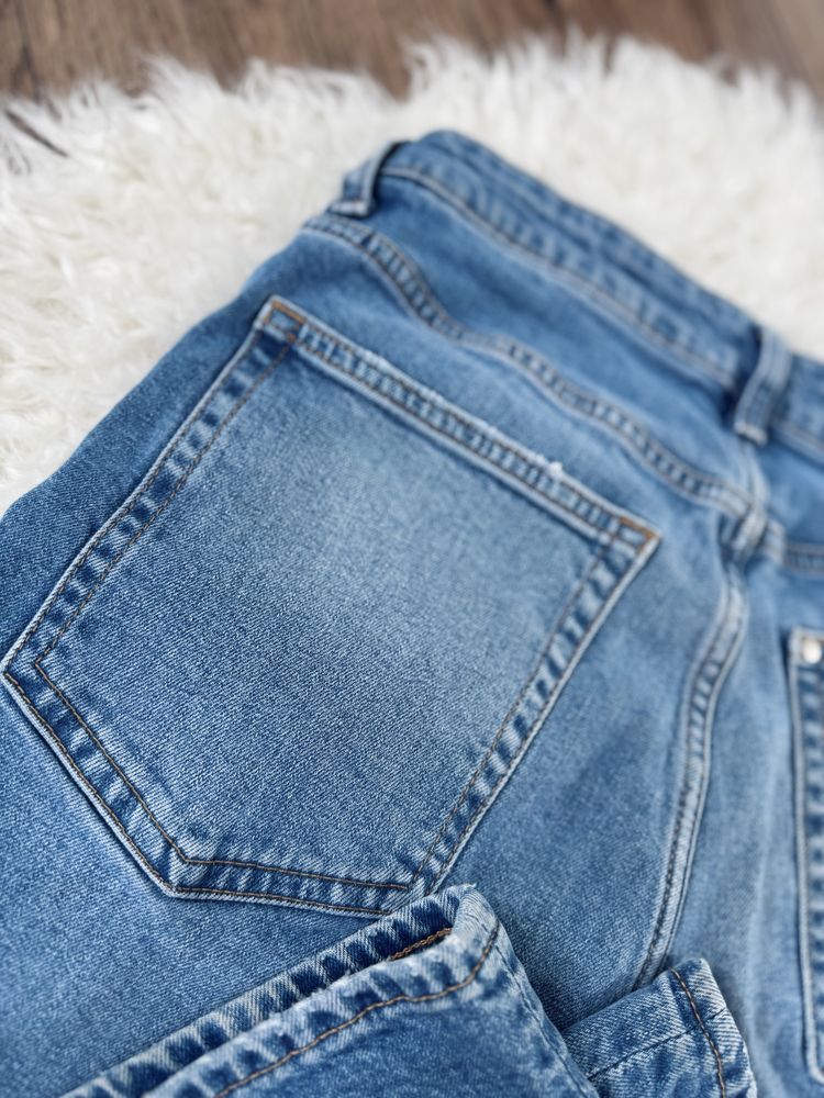 Damskie spodnie z prostą nogawką rozmiar 38 jasny jeans 99% bawełna