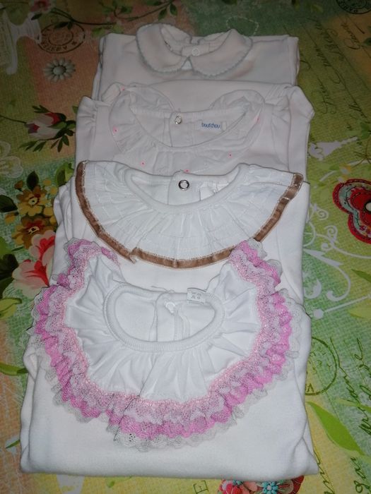 Conjunto de bodys com golinha,portes em correio normal incluído.