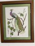 Quadro em ponto cruz pavao
