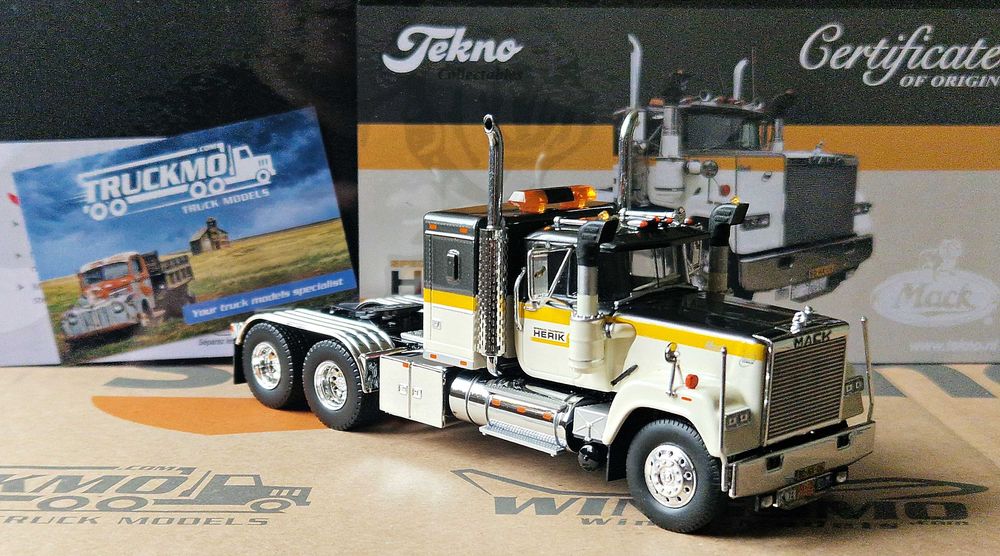 Tekno Mack RW Superliner 6x4 with 3-axle lowloader VAN DEN HERIK