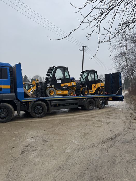 Pomoc drogowa transport maszyn laweta przerzut 18.600 kg  usługi