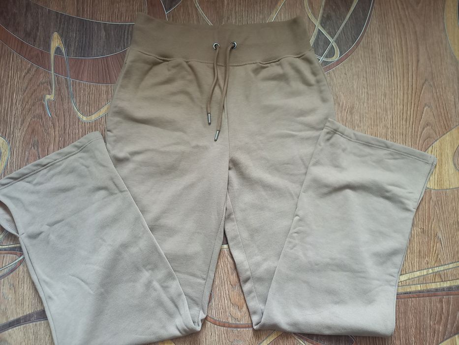 штани бежеві кльош на флісі