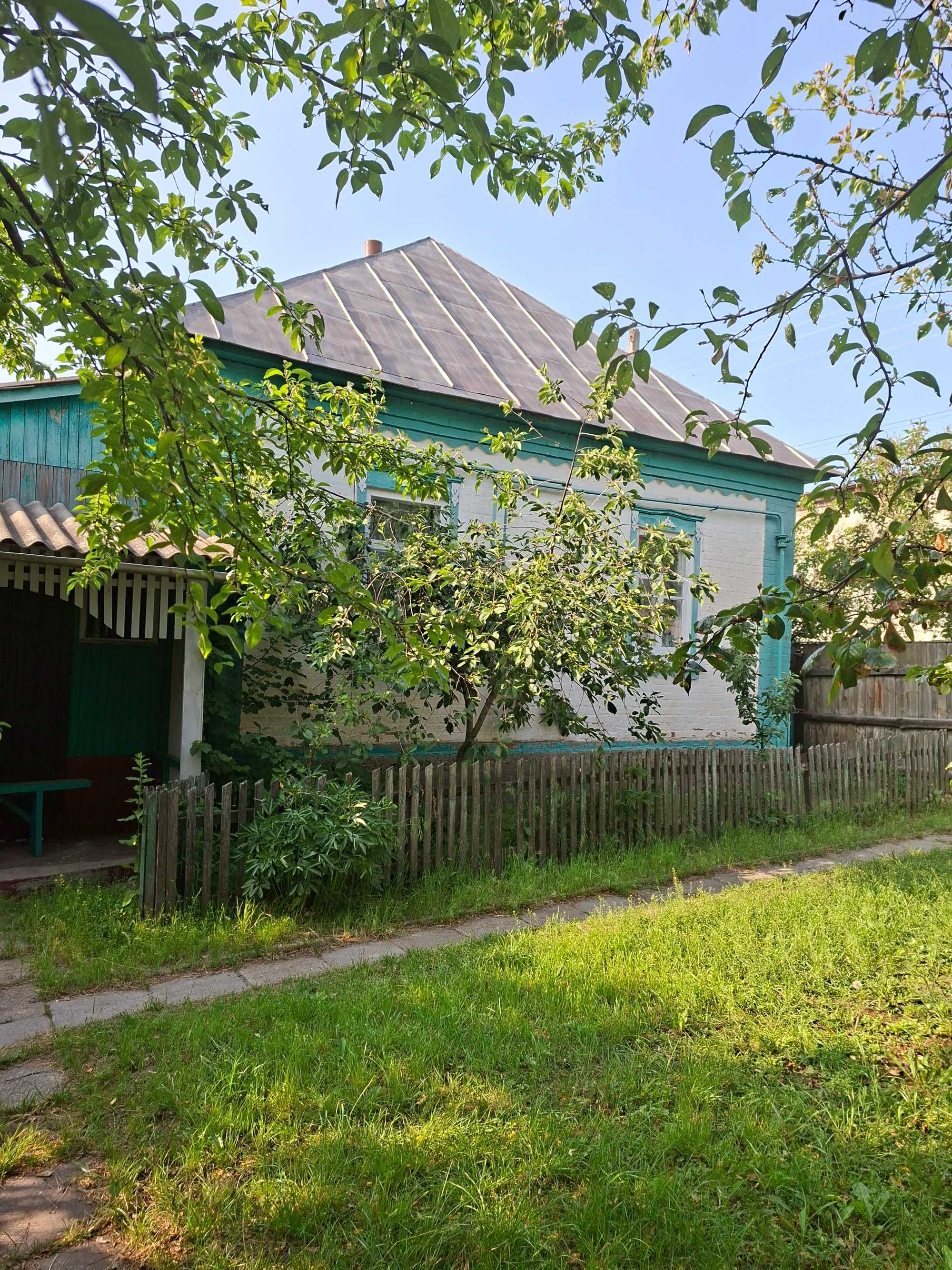 Продається господарство в центрі селища Котельва Полтавська обл.