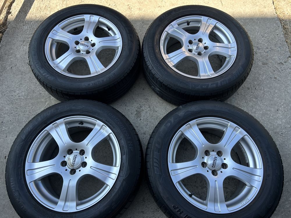 Диски 5x100 R16 Volkswagen Skoda Subaru Seat Toyota з шинами 215/60R16