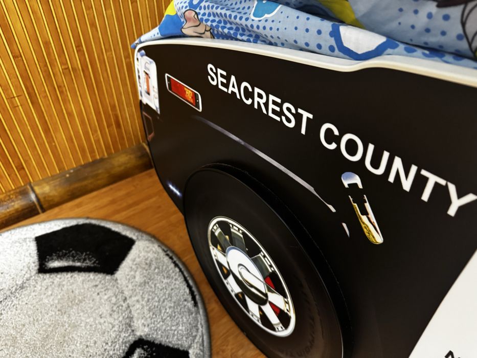 Дитяче ліжечко машина-поліція