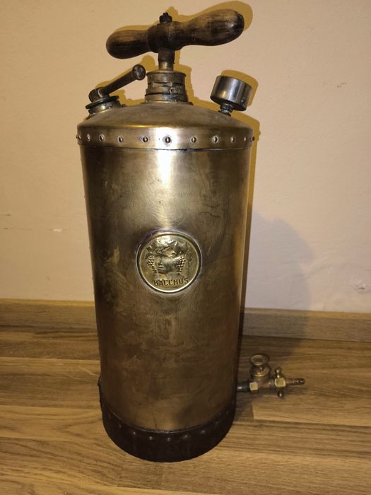 Pulverizador antigo em latão.