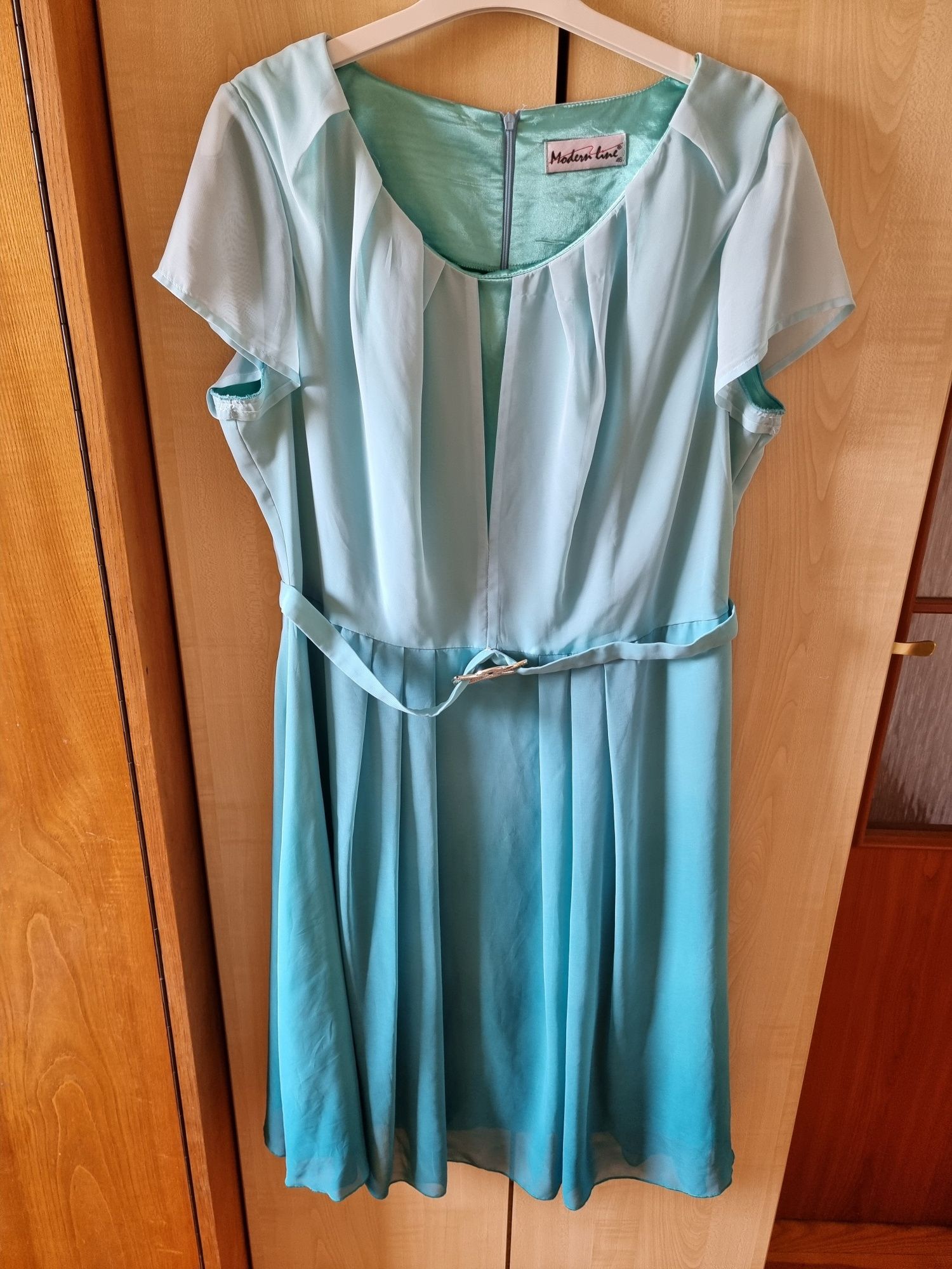 Elegancka, miętową sukienka