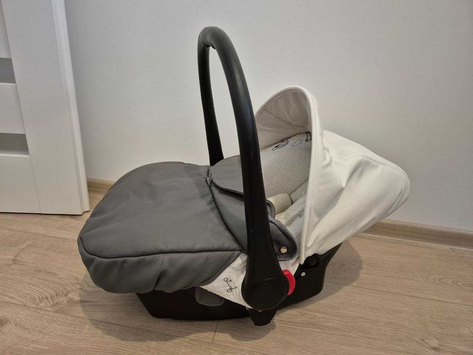 Fotelik nosidełko samochodowy firmy Tako + adaptery