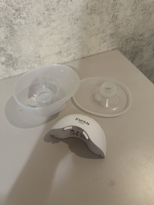 Молоковідсмоктувач разом з пакетами для молока