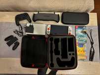 Nintendo Switch OLED + Zelda + Pokemon Let's Go Pikachu + Akcesoria.