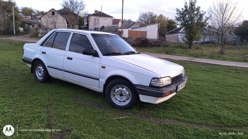 Продам Мазду 323.