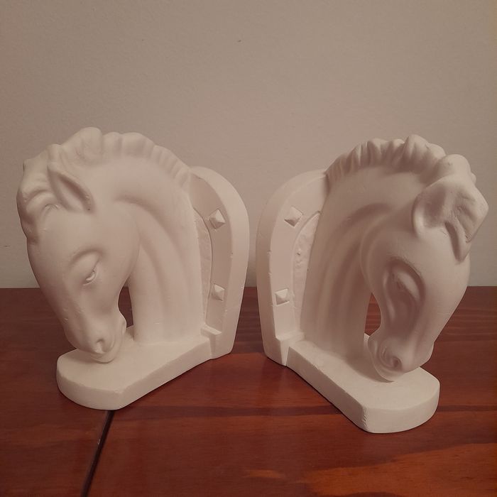 Suporte para livros cavalos