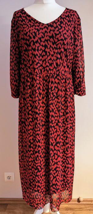 Elegancka sukienka ażurowa z podszewką – rozmiar 40-42