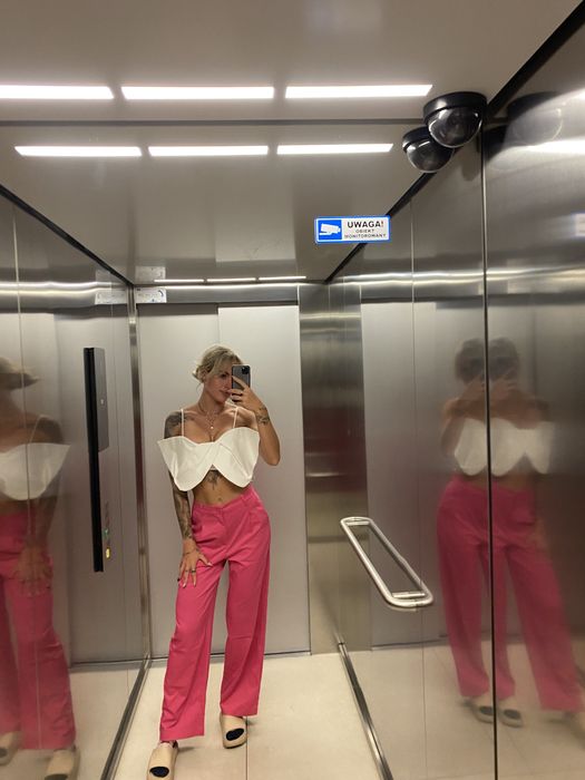 Rozowe eleganckie lub codziennie spodnie