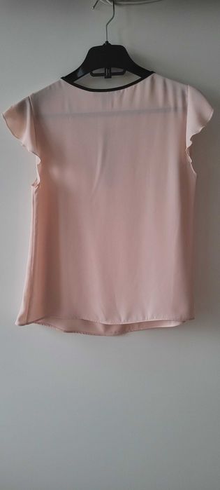 Blusa completamente nova