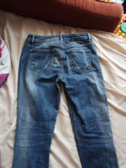 Jeansy przetarte