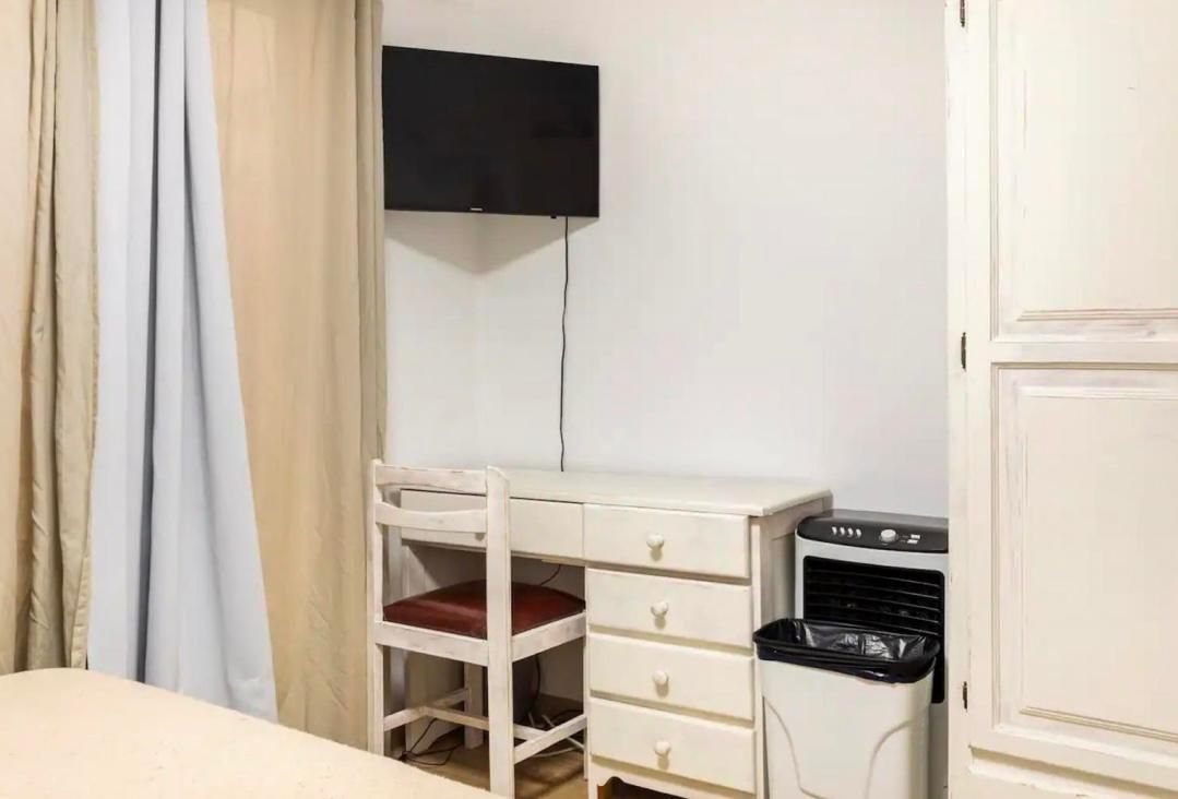 Quarto no centro do porto