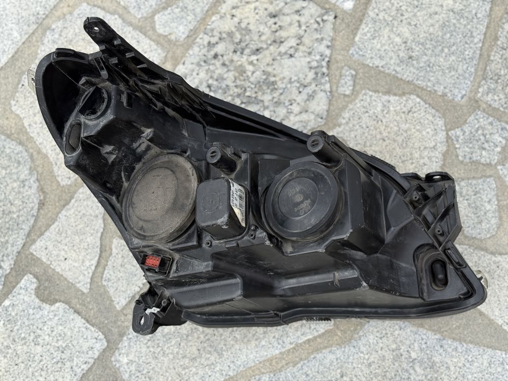 Farol esquerdo Opel Astra H