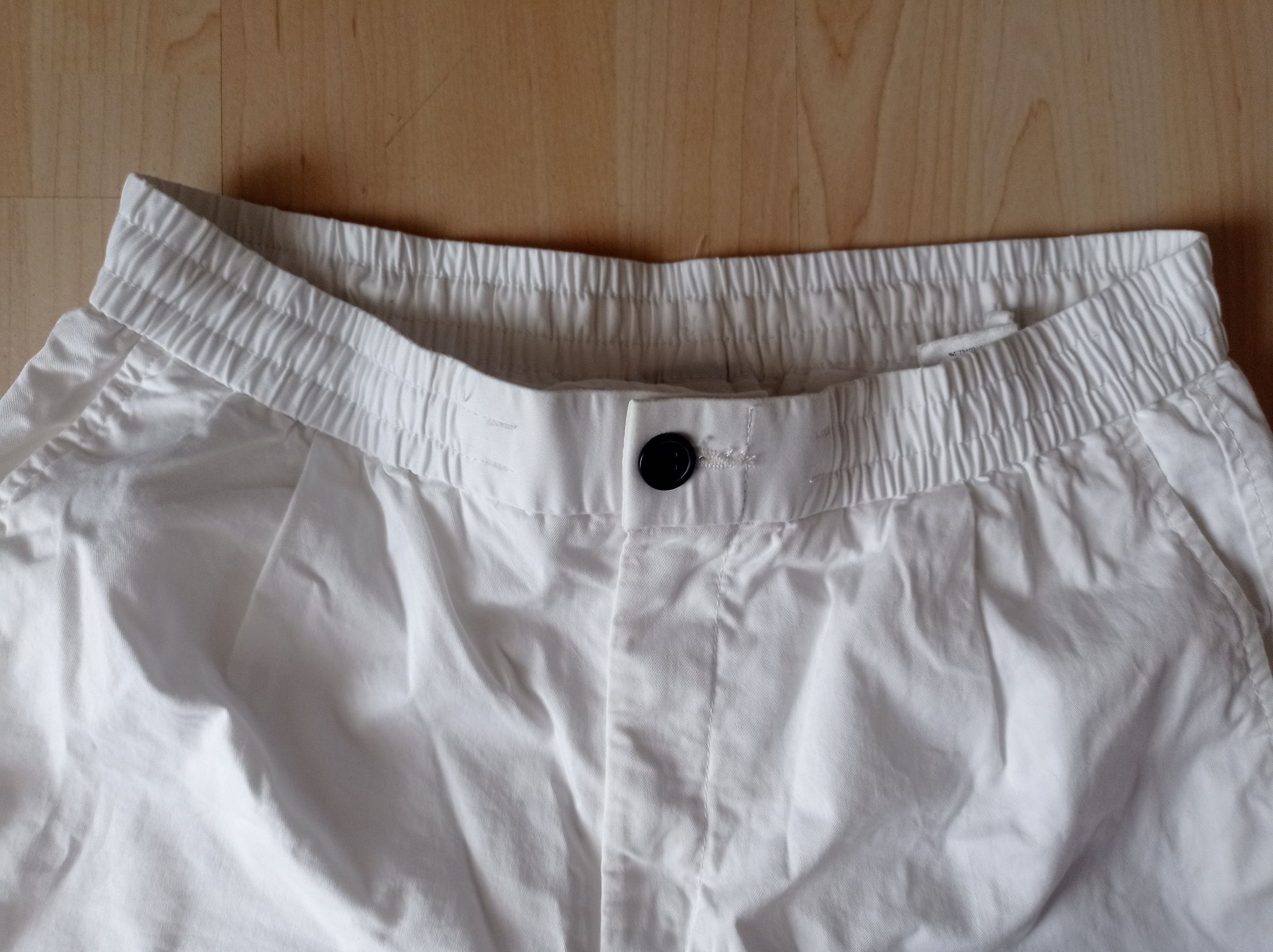 Białe spodnie męskie H&M