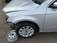 Błotnik Passat B7 Lewy LA7W