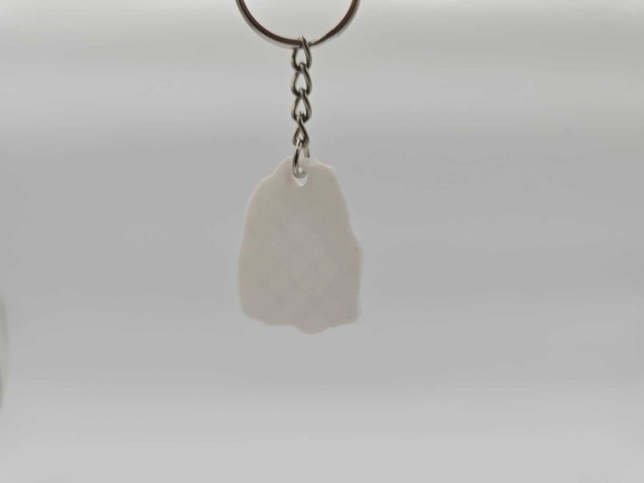 Ślad Giganta — breloczek skamieniałe odbicie stopy T-rex - Druk 3D