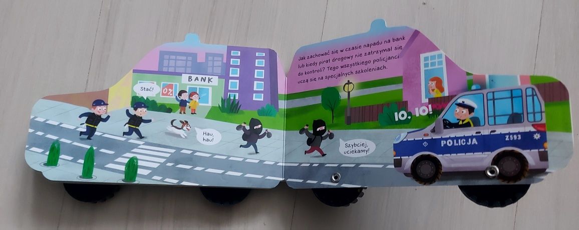 Radiowóz Wóz policyjny Świat na kółkach Książeczka zabawka Auto Aksjom
