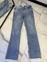 Прямі джинси з розрізами 36р