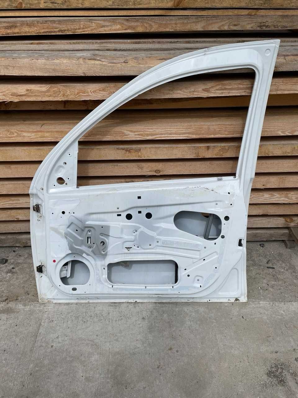 Двері OPEL Combo.