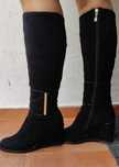 Botas em pele femininas